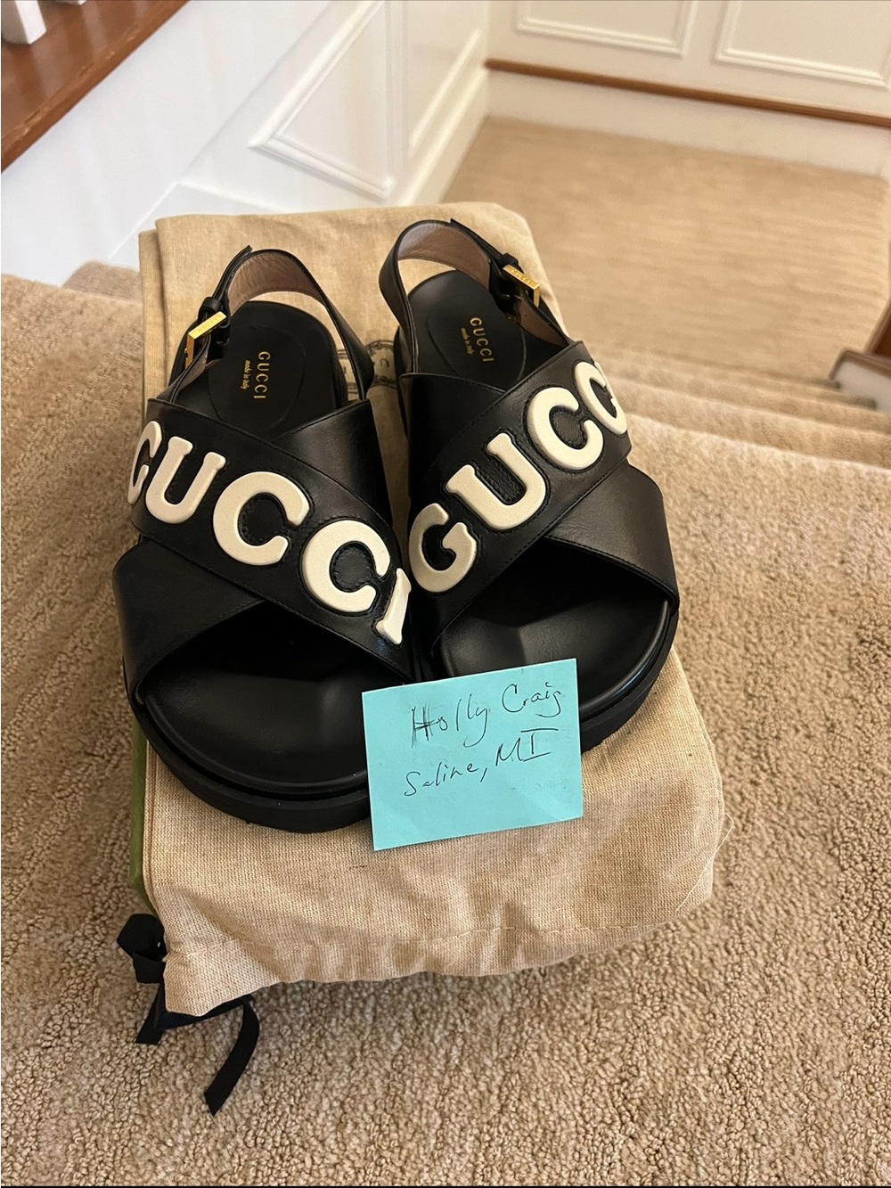 Gucci Black Leather Logo Cross-Strap Sandals with White Lettering